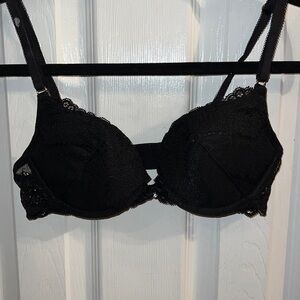 NWOT black lace bra by Sexy Secrets.  Size 32B .  Slightly padded